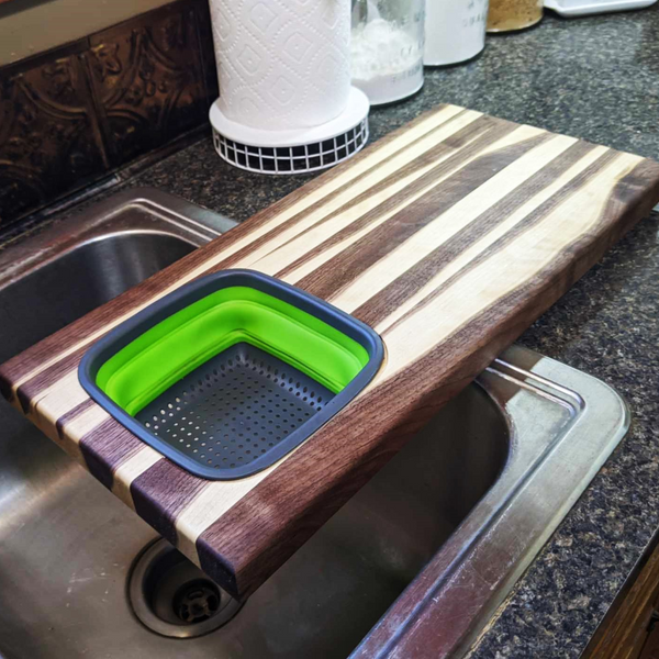 Large Over The Sink Black Walnut Edge Grain Cutting Board with Colander and Clear Rubber Grip Feet