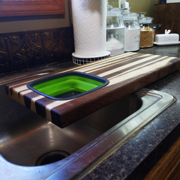 Large Over The Sink Black Walnut Edge Grain Cutting Board with Colander and Clear Rubber Grip Feet
