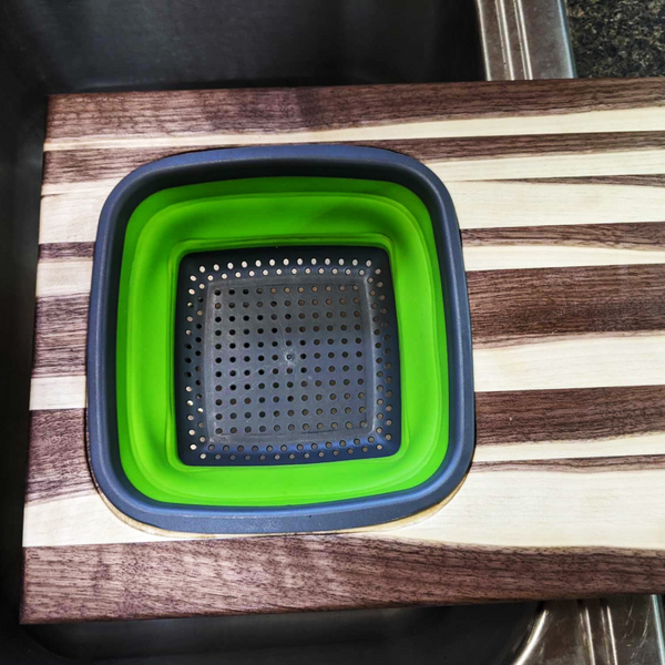 Large Over The Sink Black Walnut Edge Grain Cutting Board with Colander and Clear Rubber Grip Feet