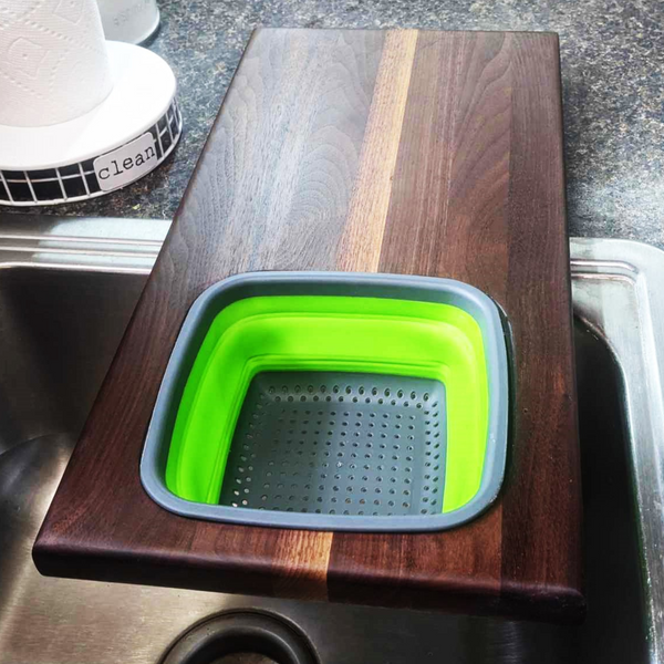 Over The Sink Black Walnut Edge Grain Cutting Board with Colander and Clear Rubber Grip Feet