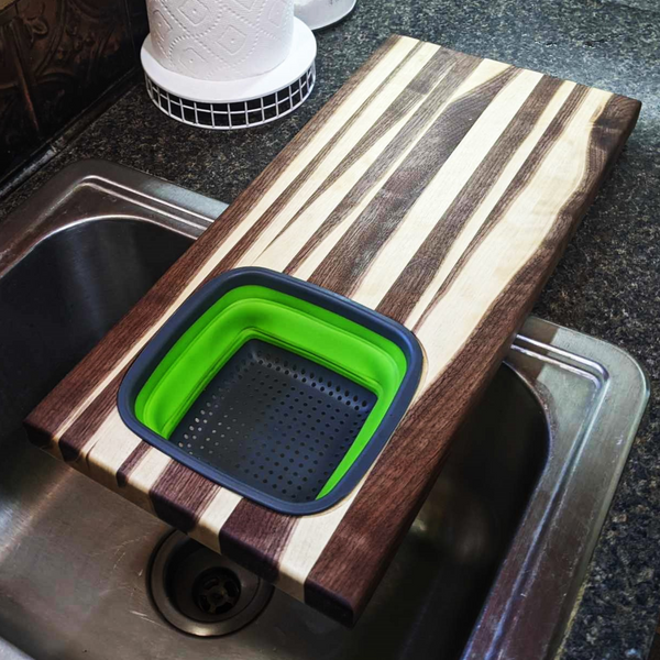 Large Over The Sink Black Walnut Edge Grain Cutting Board with Colander and Clear Rubber Grip Feet