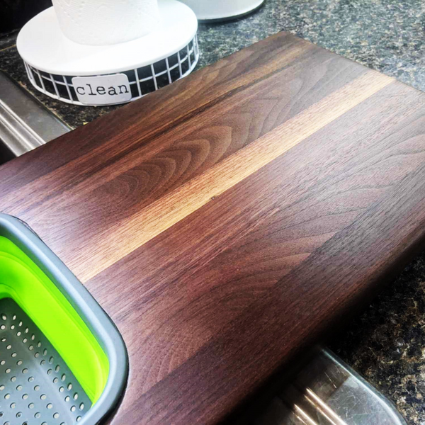 Over The Sink Black Walnut Edge Grain Cutting Board with Colander and Clear Rubber Grip Feet