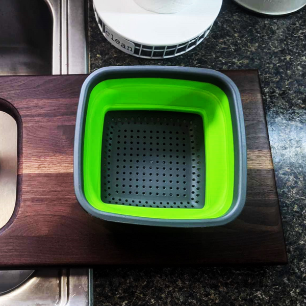 Over The Sink Black Walnut Edge Grain Cutting Board with Colander and Clear Rubber Grip Feet