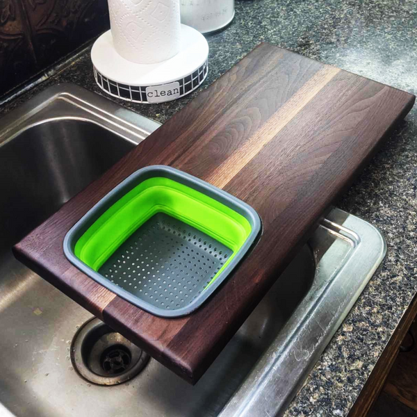 Over The Sink Black Walnut Edge Grain Cutting Board with Colander and Clear Rubber Grip Feet
