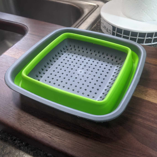 Over The Sink Black Walnut Edge Grain Cutting Board with Colander and Clear Rubber Grip Feet