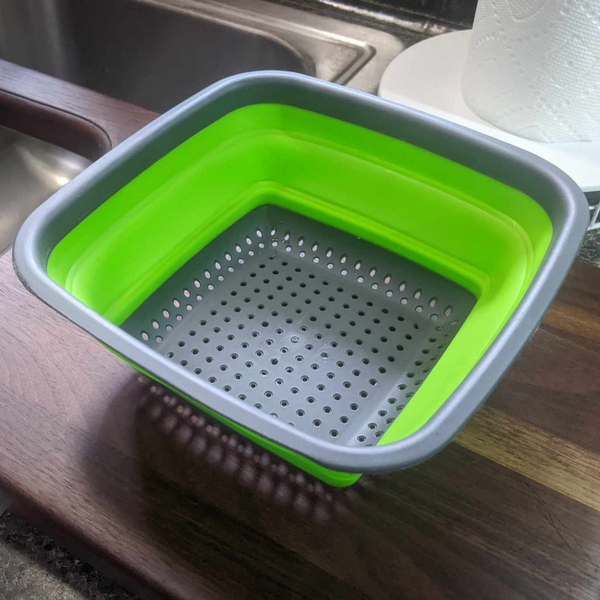 Over The Sink Black Walnut Edge Grain Cutting Board with Colander and Clear Rubber Grip Feet