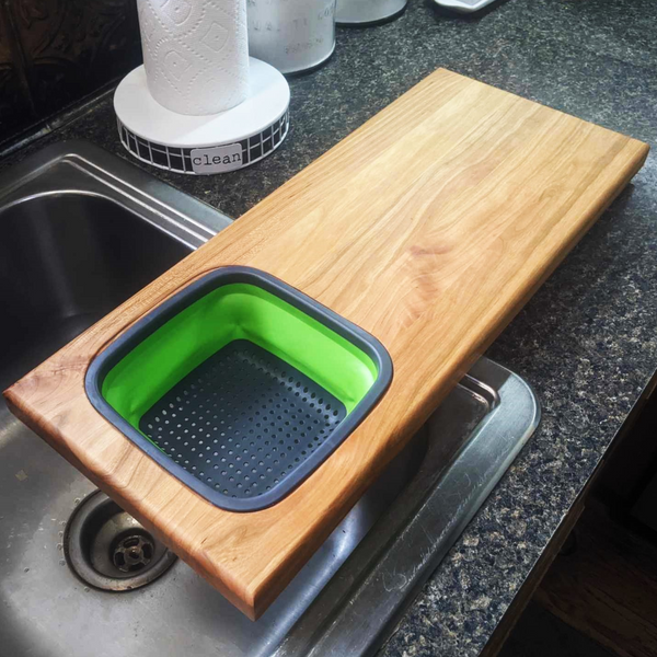 Over the Sink Cherry Wood Edge Grain Cutting Board with Colander and Clear Rubber Grip Feet