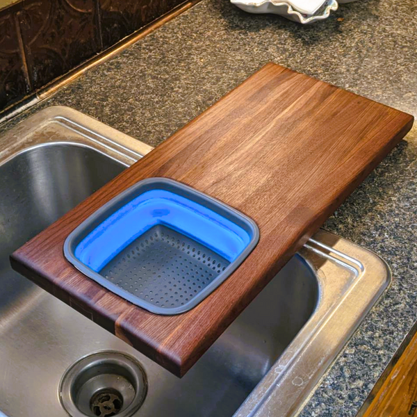Over The Sink Black Walnut Edge Grain Cutting Board with Colander and Clear Rubber Grip Feet