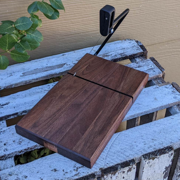 Black Walnut cheese slicer board.