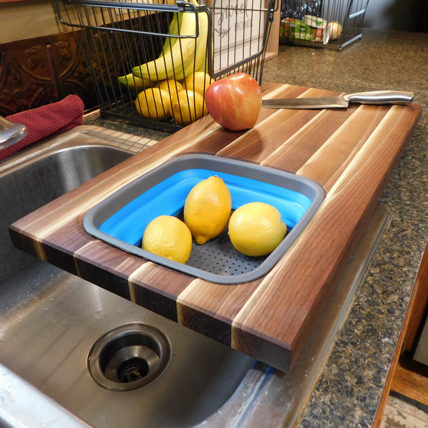 Large Over The Sink Black Walnut Edge Grain Cutting Board with Colander and Clear Rubber Grip Feet