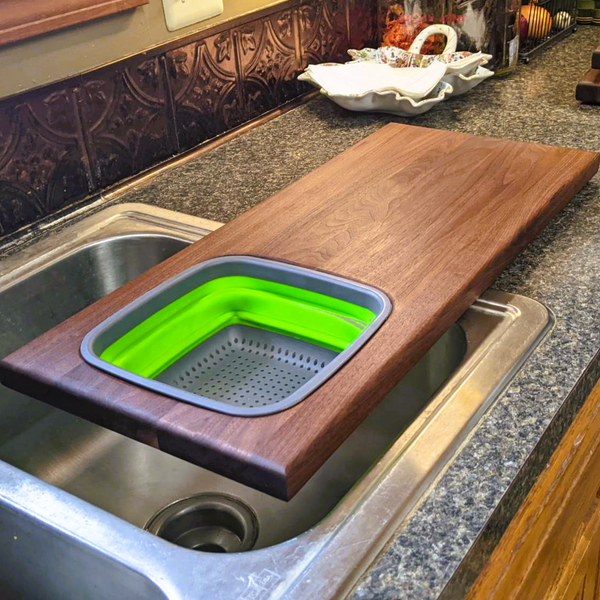 Large Over The Sink Black Walnut Edge Grain Cutting Board with Colander and Clear Rubber Grip Feet