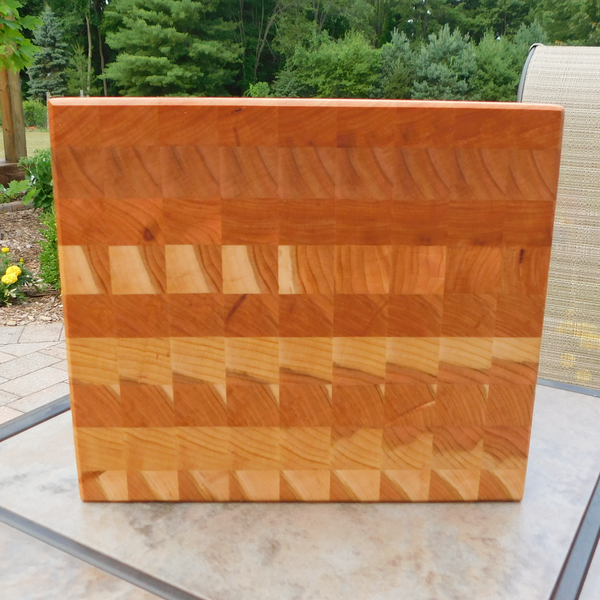 Cherry Wood End Grain Cutting Board with a Beveled Edge & Hand Grooves On Sides