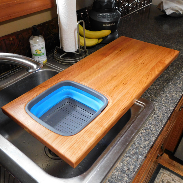 Extra Large Over The Sink Cherry Wood Edge Grain Cutting Board with Collapsible Colander and Clear Rubber Grip Feet