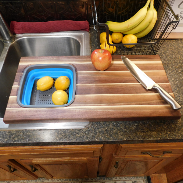Large Over The Sink Black Walnut Edge Grain Cutting Board with Colander and Clear Rubber Grip Feet