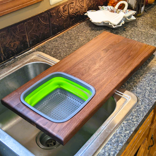 Large Over The Sink Black Walnut Edge Grain Cutting Board with Colander and Clear Rubber Grip Feet