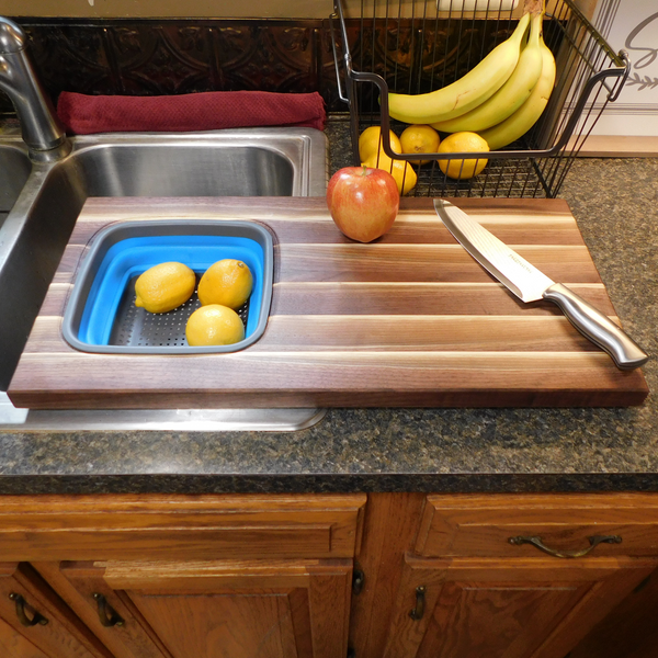 Large Over The Sink Black Walnut Edge Grain Cutting Board with Colander and Clear Rubber Grip Feet