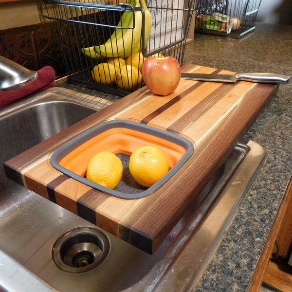 Large Over The Sink Black Walnut & Cherry Wood Edge Grain Cutting Board with Colander and Clear Rubber Grip Feet