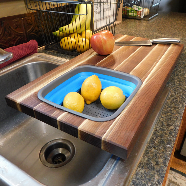 Large Over The Sink Black Walnut Edge Grain Cutting Board with Colander and Clear Rubber Grip Feet