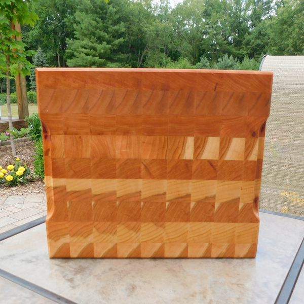Cherry Wood End Grain Cutting Board with a Beveled Edge & Hand Grooves On Sides