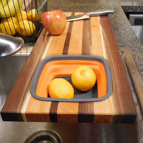 Large Over The Sink Black Walnut & Cherry Wood Edge Grain Cutting Board with Colander and Clear Rubber Grip Feet