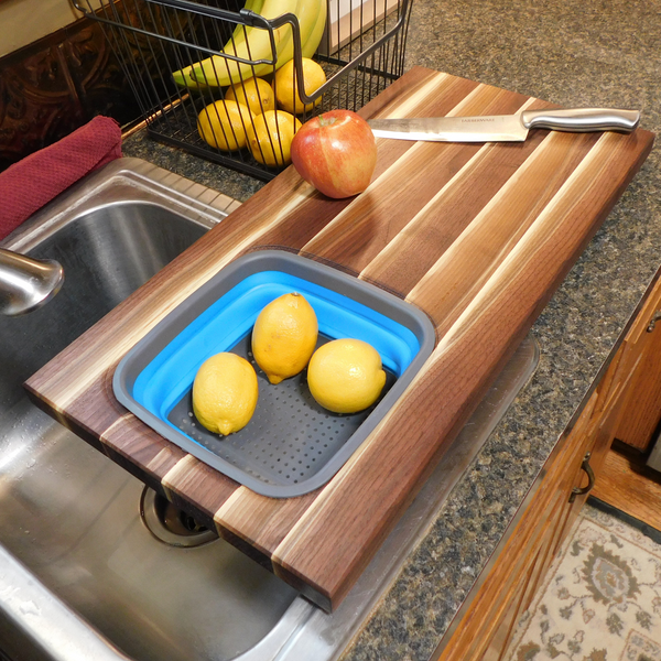 Large Over The Sink Black Walnut Edge Grain Cutting Board with Colander and Clear Rubber Grip Feet