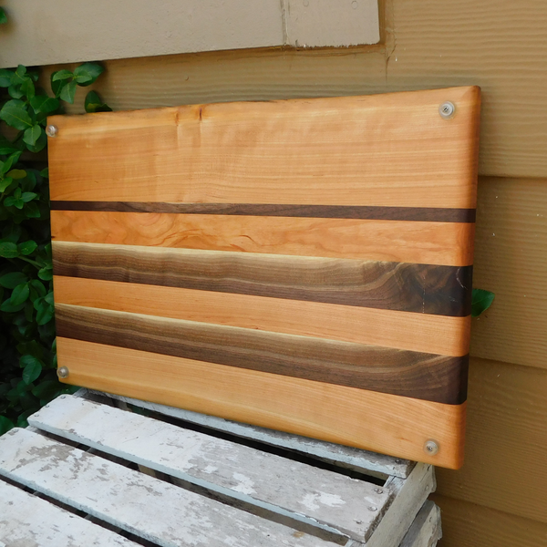 Cherry Wood & Black Walnut Edge Grain Cutting Board with Cast Iron Handles, Clear Rubber Grip Feet & a Beveled Edge
