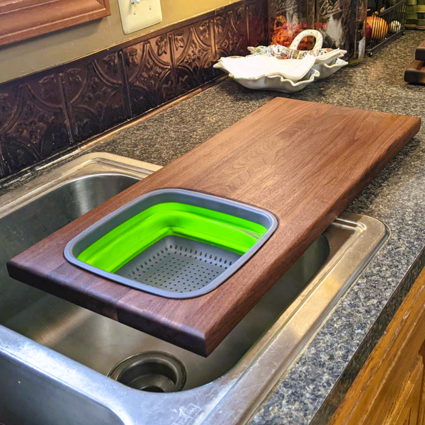 Large Over The Sink Black Walnut Edge Grain Cutting Board with Colander and Clear Rubber Grip Feet