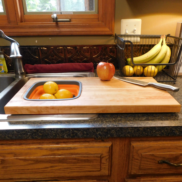Over The Sink Cherry Wood Edge Grain Cutting Board with Colander and Clear Rubber Grip Feet