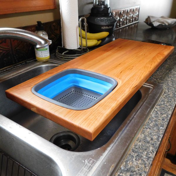 Extra Large Over The Sink Cherry Wood Edge Grain Cutting Board with Collapsible Colander and Clear Rubber Grip Feet