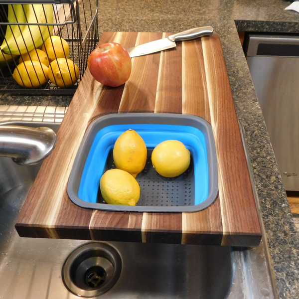 Large Over The Sink Black Walnut Edge Grain Cutting Board with Colander and Clear Rubber Grip Feet