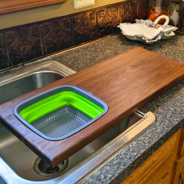 Large Over The Sink Black Walnut Edge Grain Cutting Board with Colander and Clear Rubber Grip Feet