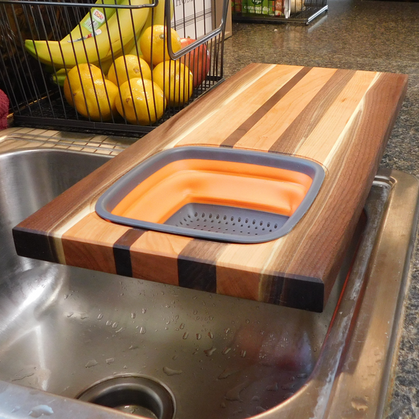 Large Over The Sink Black Walnut & Cherry Wood Edge Grain Cutting Board with Colander and Clear Rubber Grip Feet
