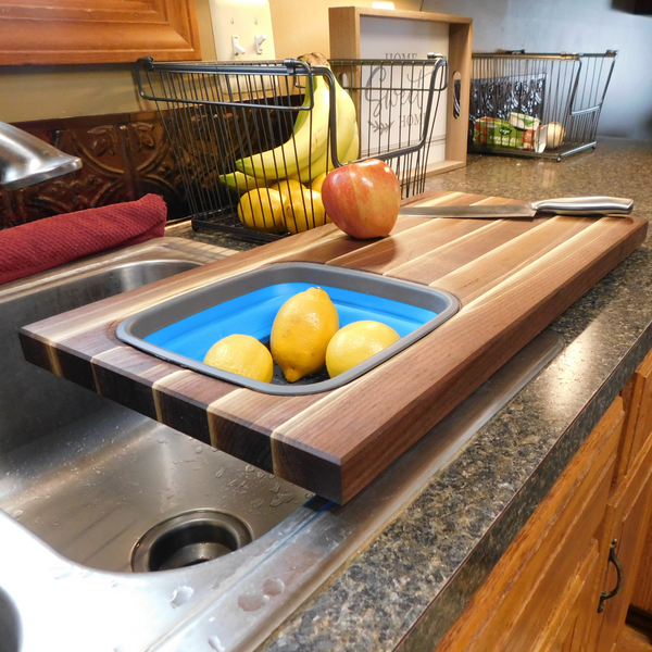 Large Over The Sink Black Walnut Edge Grain Cutting Board with Colander and Clear Rubber Grip Feet