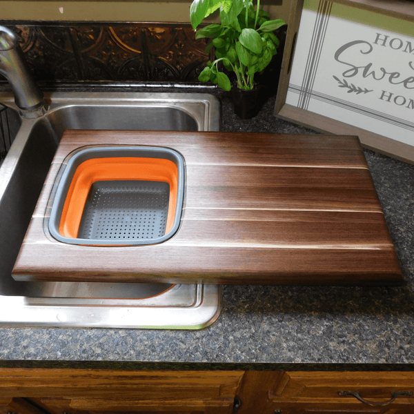 Large Over The Sink Black Walnut Edge Grain Cutting Board with Colander and Clear Rubber Grip Feet