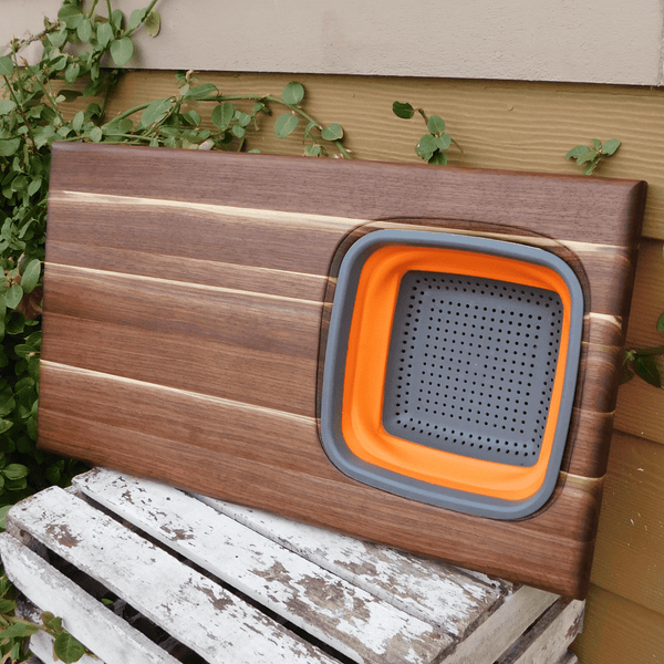 Large Over The Sink Black Walnut Edge Grain Cutting Board with Colander and Clear Rubber Grip Feet