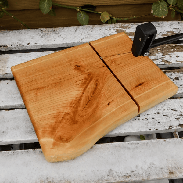 Cherry Wood cheese cutting board, finished in a food grade oil and beeswax mixture.