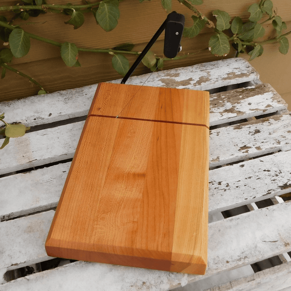 Cheery Wood butcher block cheese cutting board.