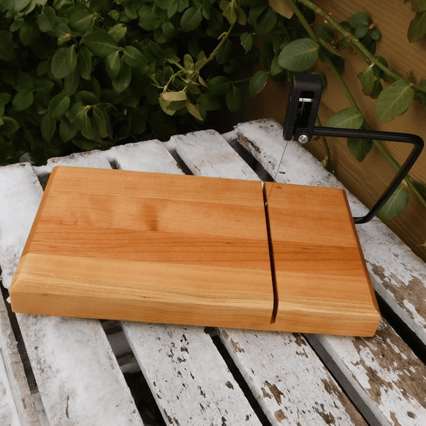 Cheery Wood butcher block cheese cutting board.