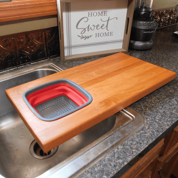 Over The Sink Cherry Wood Edge Grain Cutting Board with Collapsible Colander and Clear Rubber Grip Feet