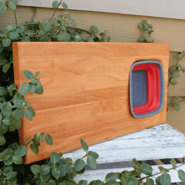 Over The Sink Cherry Wood Edge Grain Cutting Board with Collapsible Colander and Clear Rubber Grip Feet
