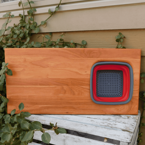 Over The Sink Cherry Wood Edge Grain Cutting Board with Collapsible Colander and Clear Rubber Grip Feet