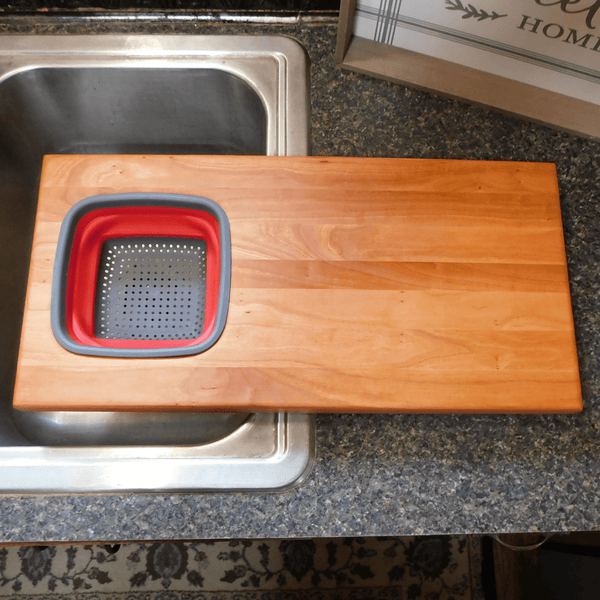 Over The Sink Cherry Wood Edge Grain Cutting Board with Collapsible Colander and Clear Rubber Grip Feet