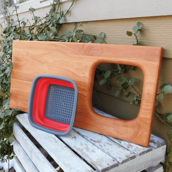Over The Sink Cherry Wood Edge Grain Cutting Board with Collapsible Colander and Clear Rubber Grip Feet