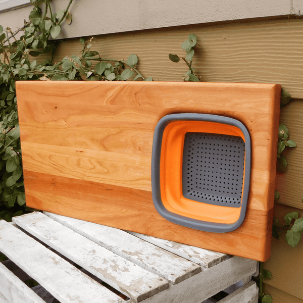 Over The Sink Cherry Wood Edge Grain Cutting Board with Collapsible Colander and Clear Rubber Grip Feet