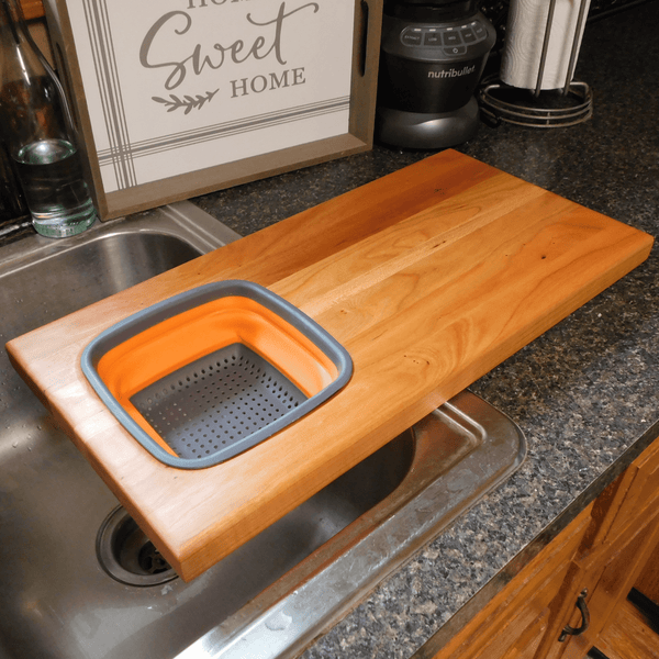 Over The Sink Cherry Wood Edge Grain Cutting Board with Collapsible Colander and Clear Rubber Grip Feet