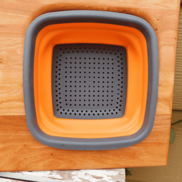 Over The Sink Cherry Wood Edge Grain Cutting Board with Collapsible Colander and Clear Rubber Grip Feet