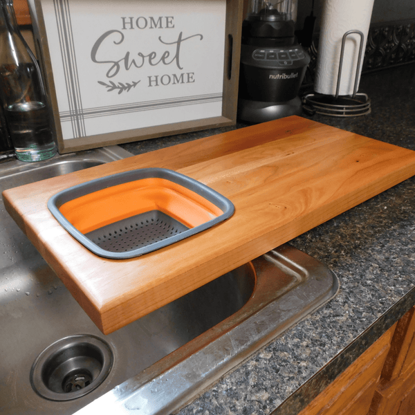Over The Sink Cherry Wood Edge Grain Cutting Board with Collapsible Colander and Clear Rubber Grip Feet