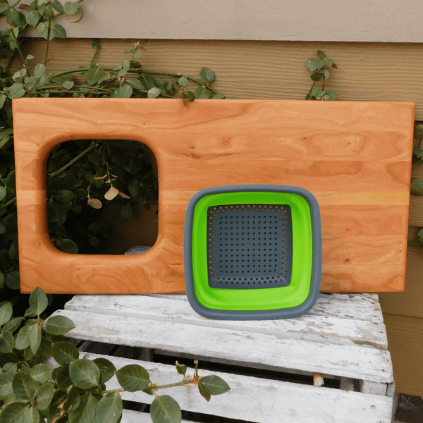 Over The Sink Cherry Wood Edge Grain Cutting Board with Collapsible Colander and Clear Rubber Grip Feet