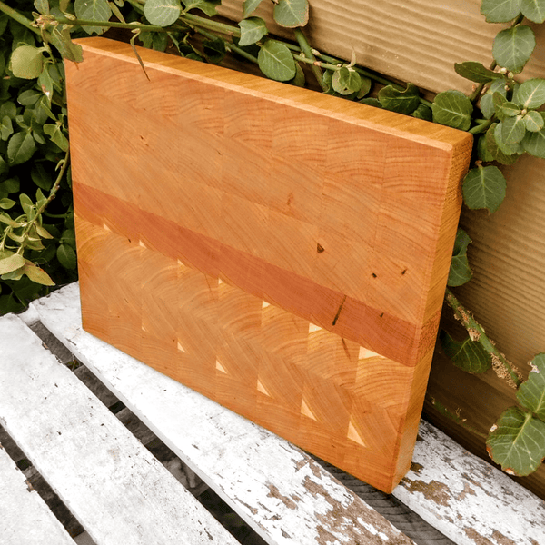 Cherry Wood end grain cutting board with beveled edge.