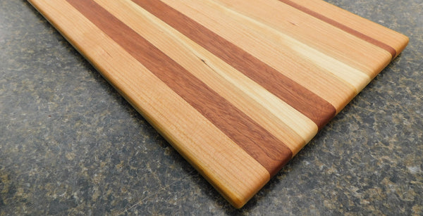 Cherry Wood & Mahogany Hardwood Edge Grain Cutting Board. Handmade in the USA using locally sourced hardwood.